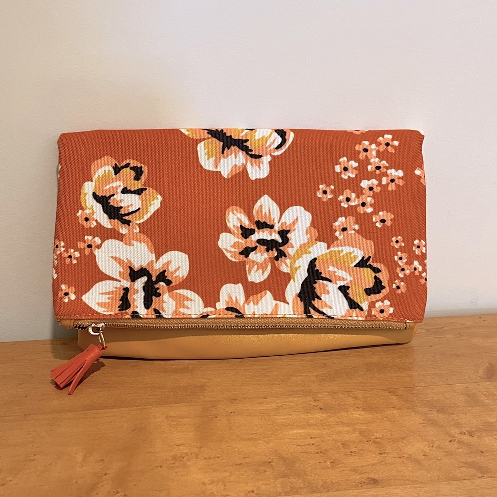 Rachel Pally clutch. Yellow floral. Never used it. Good condition.